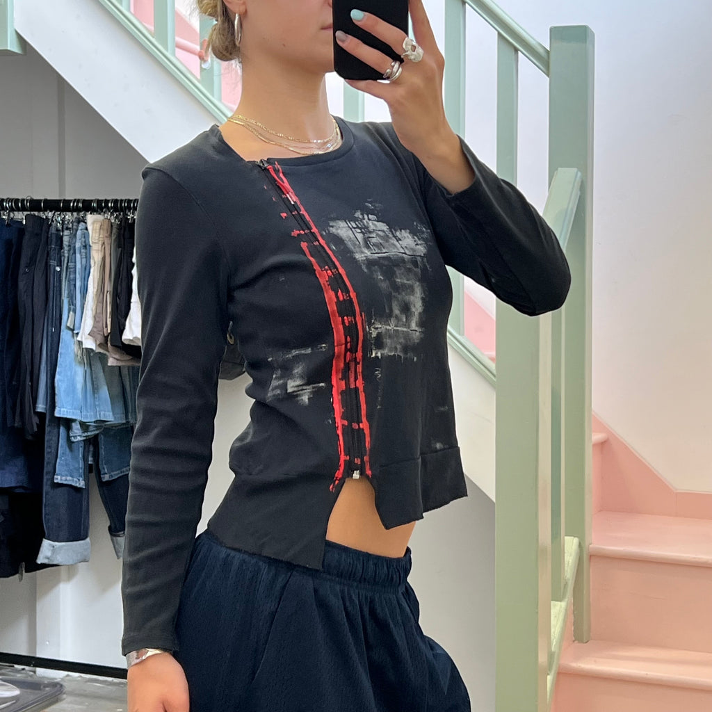 Black and red graphic print zip top