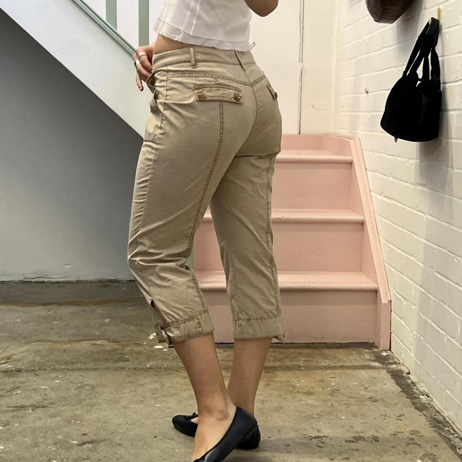 cream fitted cargo capris with buckles