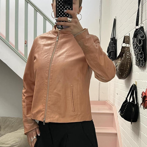 baby pink dusty pink zip up fitted vintage leather jacket with dual zip