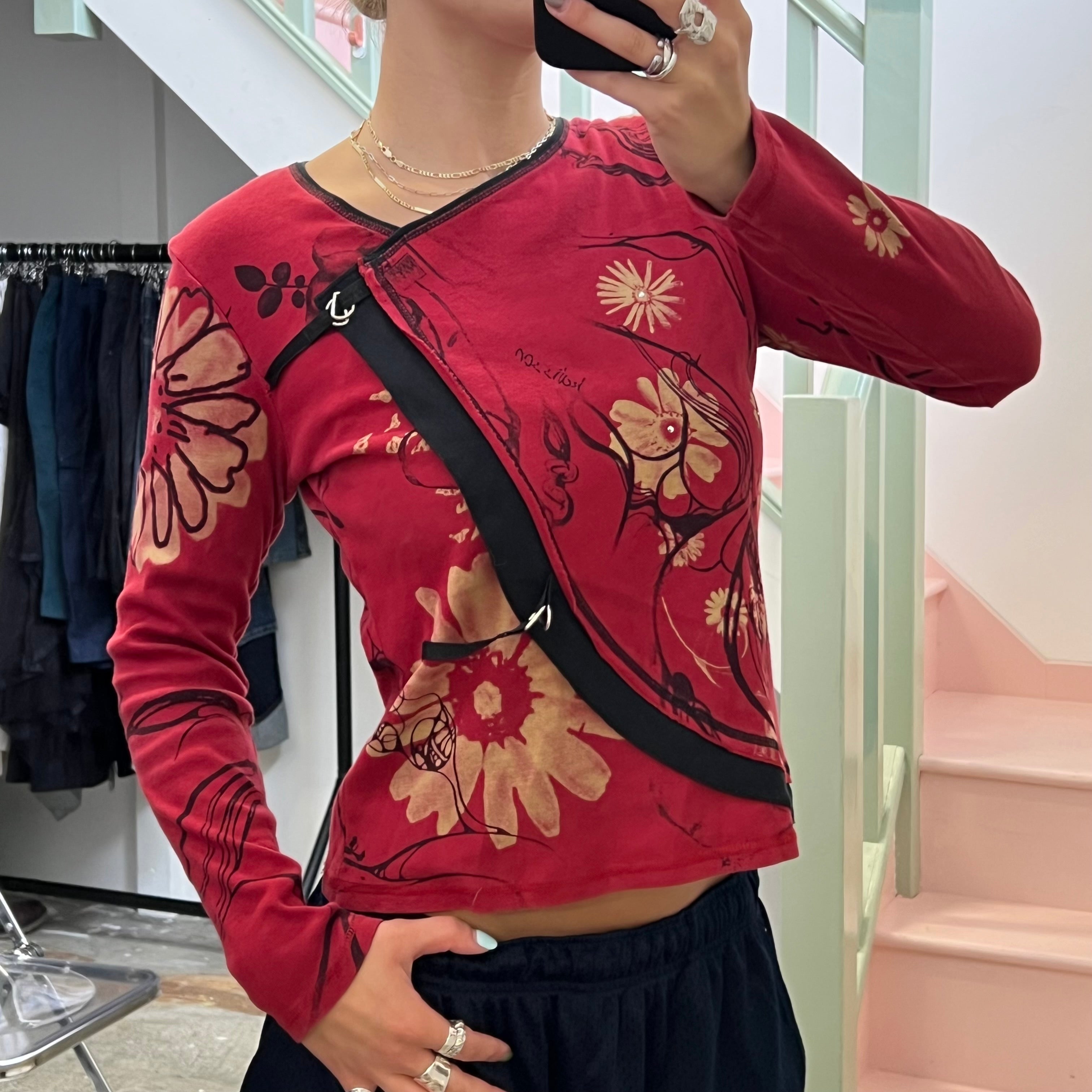 Red blurred floral long sleeve top