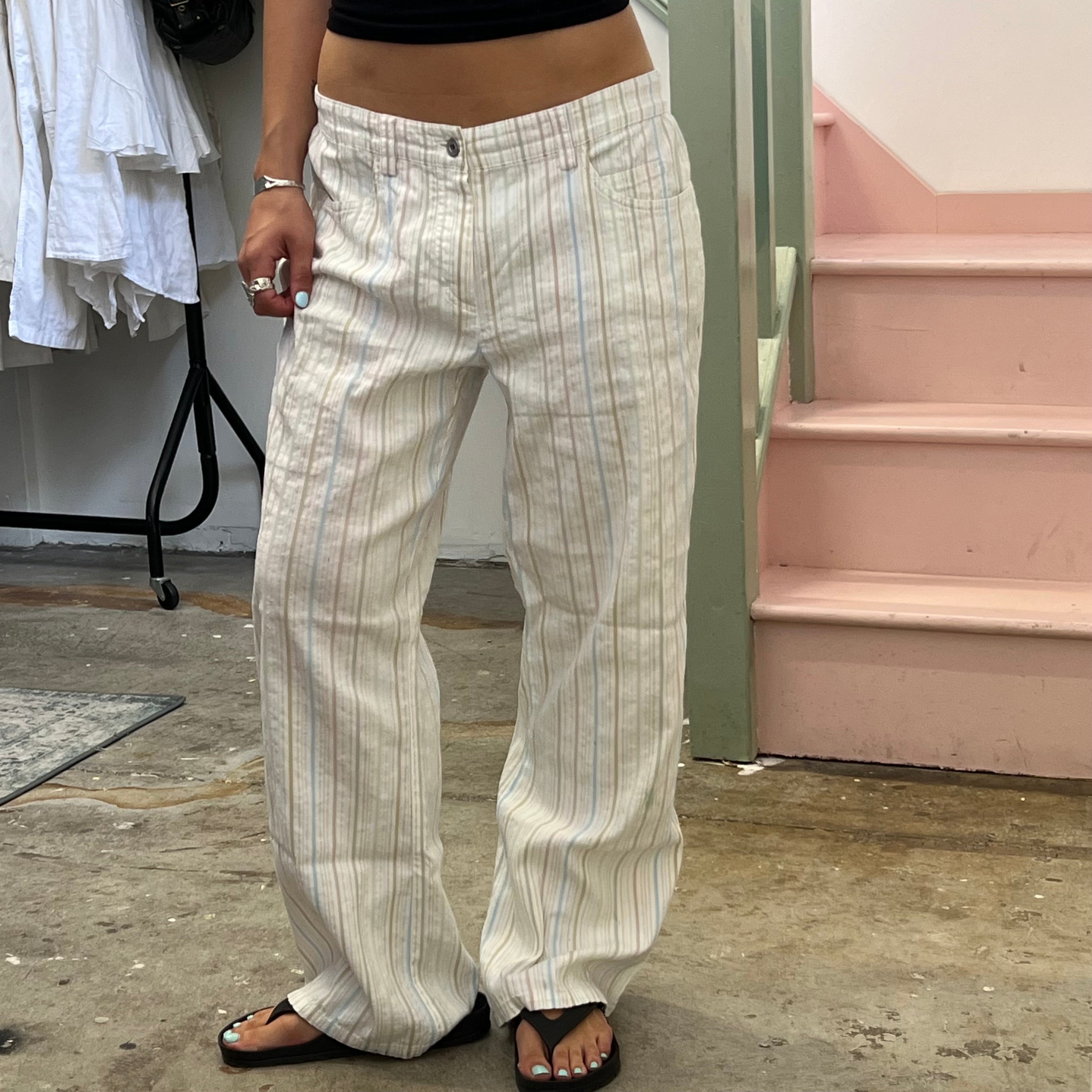 White and multi colour stripe trousers
