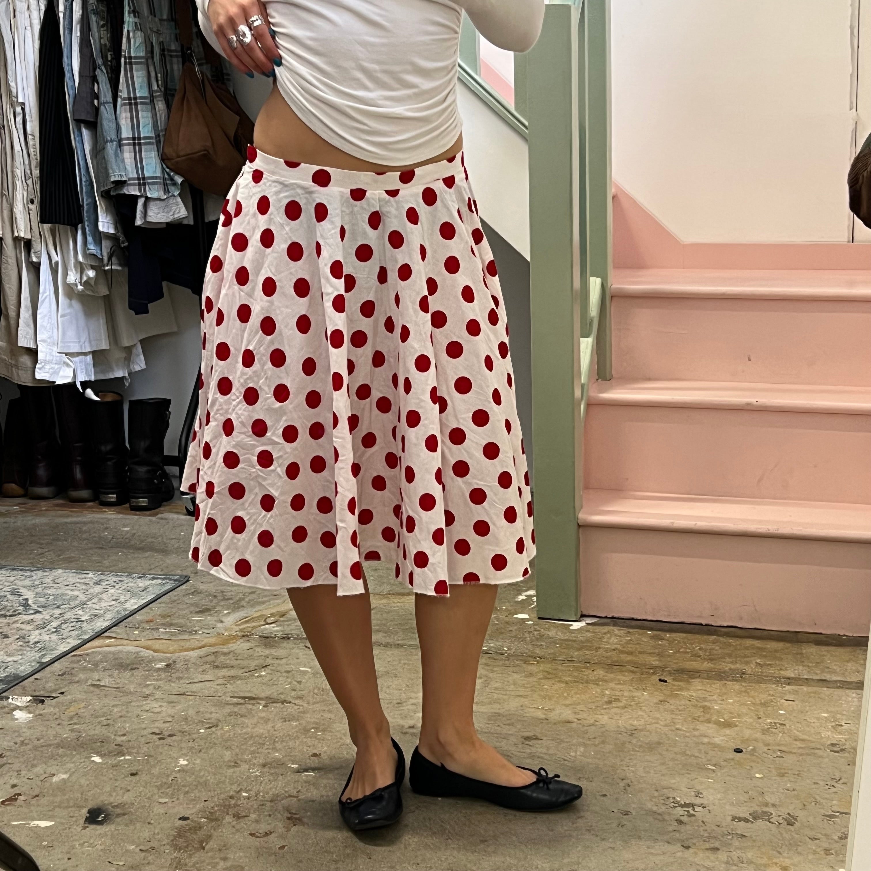 Red and white polka dot pleated midi skirt