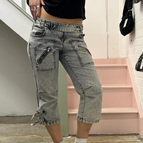 acid wash low rise denim capris with zips and buckles