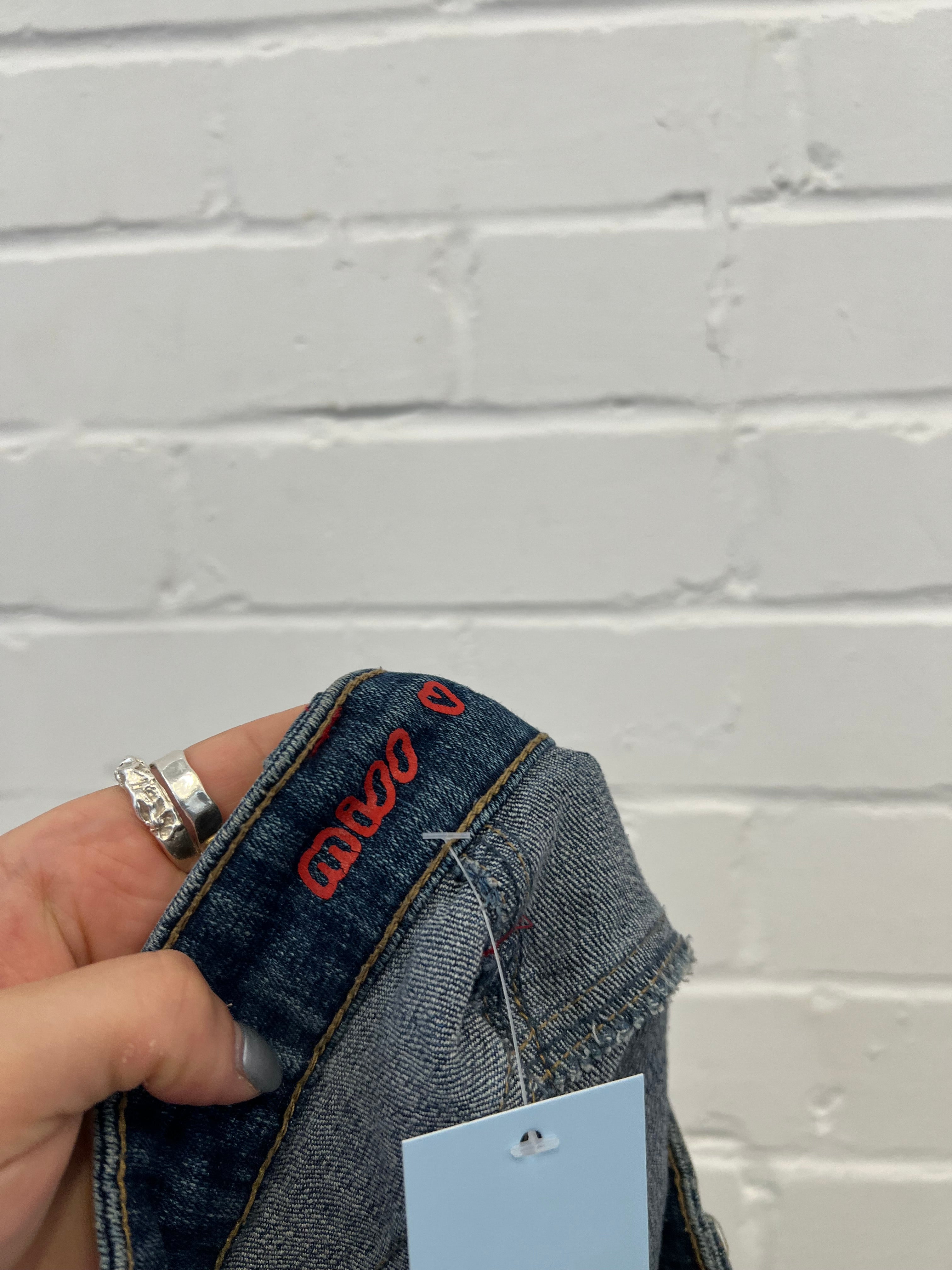 Mid wash denim mini skirt