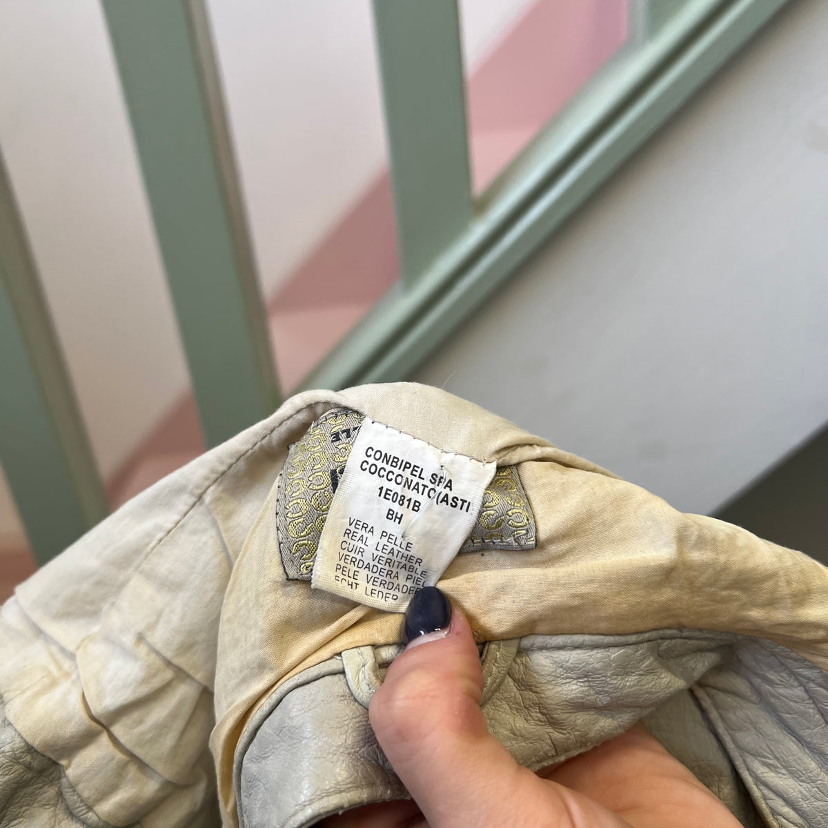 Cream zip up fitted leather jacket