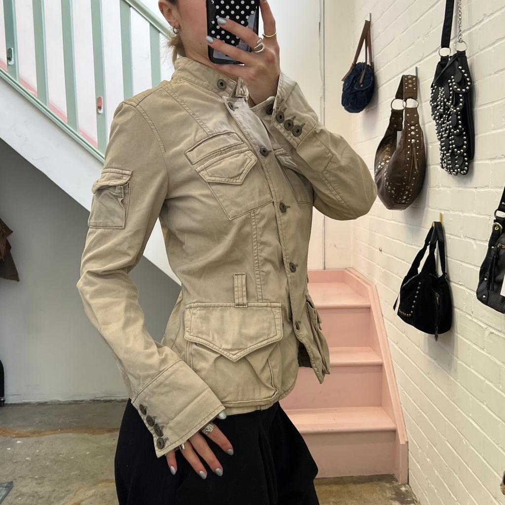 Cream button up utility style fitted jacket