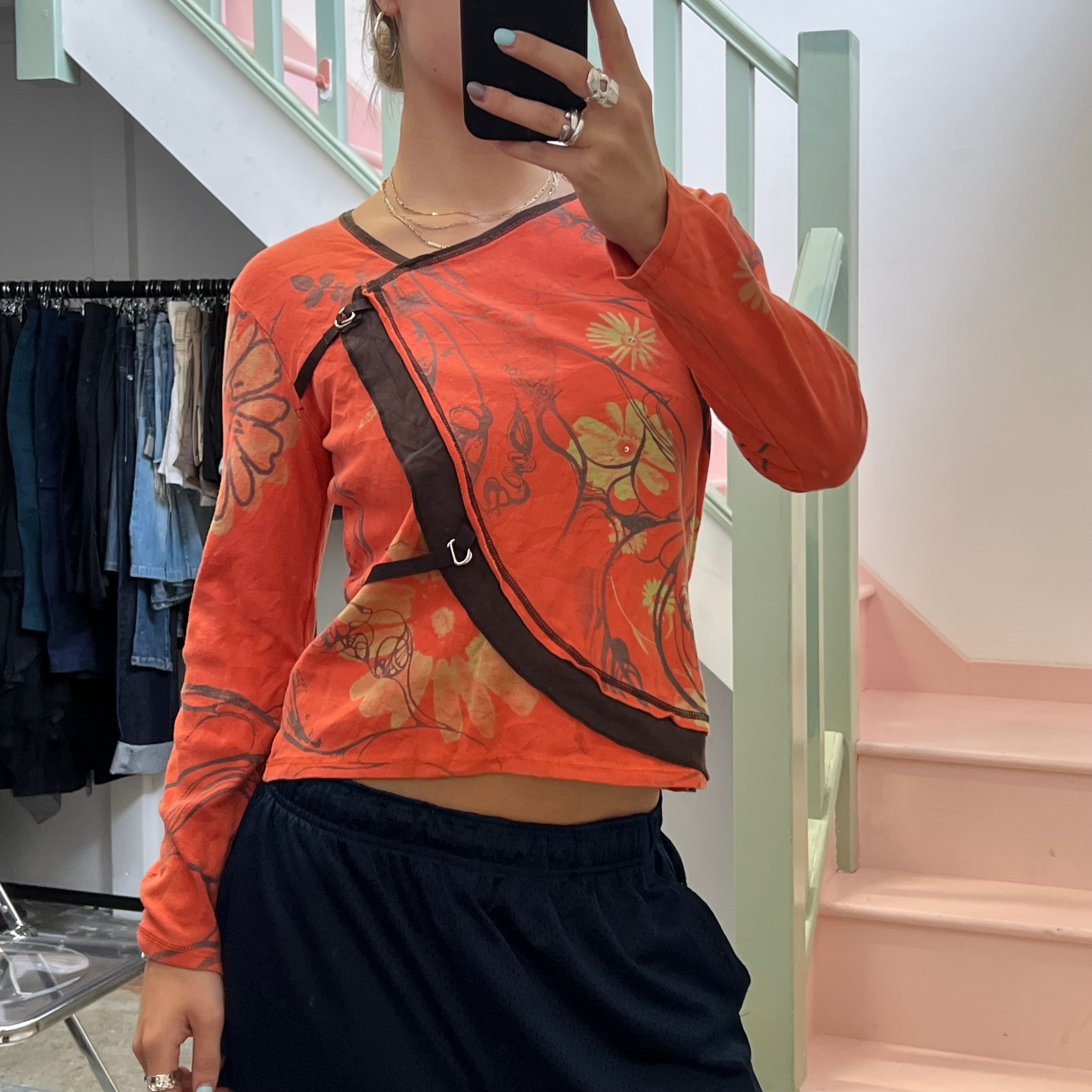 Orange blurred floral long sleeve top