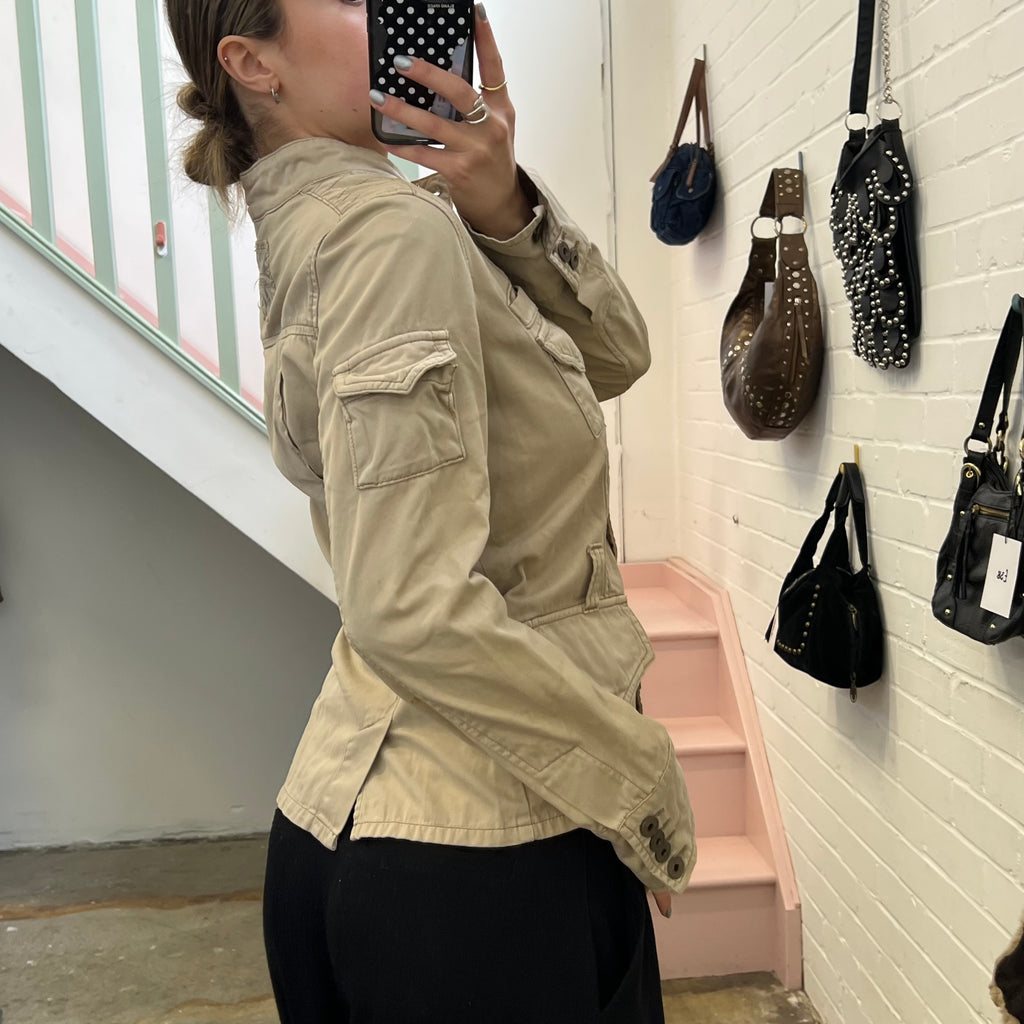 Cream button up utility style fitted jacket