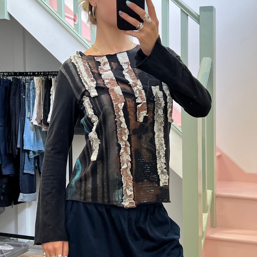 Black textured long sleeve top