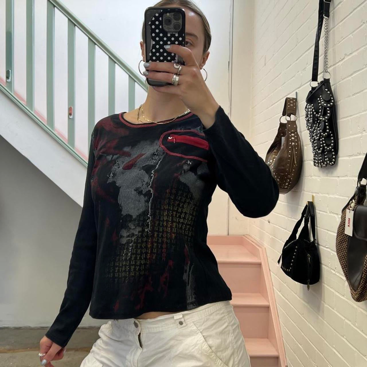 Black and red graphic print long sleeve top