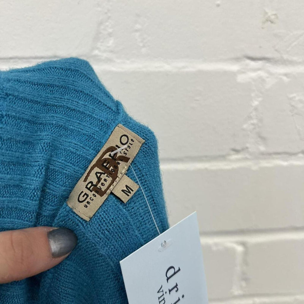 blue knitted off shoulder button up cashmere blend sweater