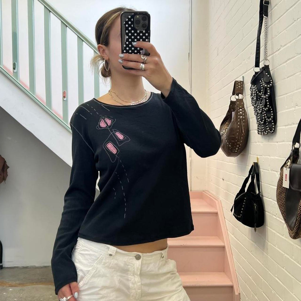 Black and pink graphic long sleeve top