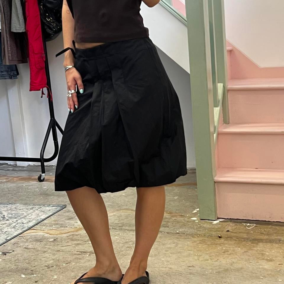 Black pleated bubble midi skirt