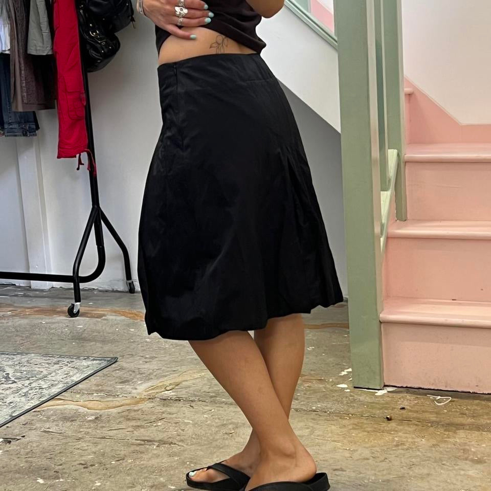 Black pleated bubble midi skirt