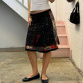 Black graphic print patchwork midi skirt