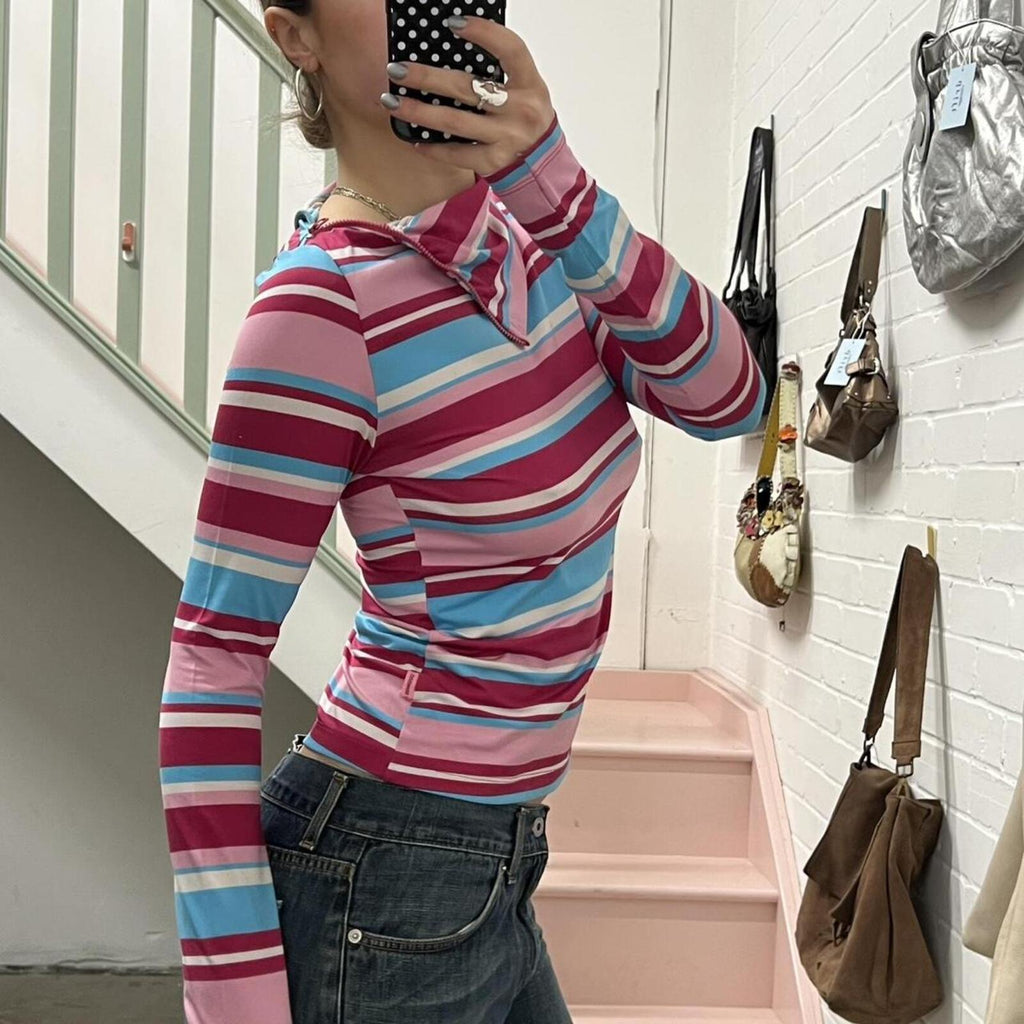 pink and blue striped high neck fitted top with zip detail