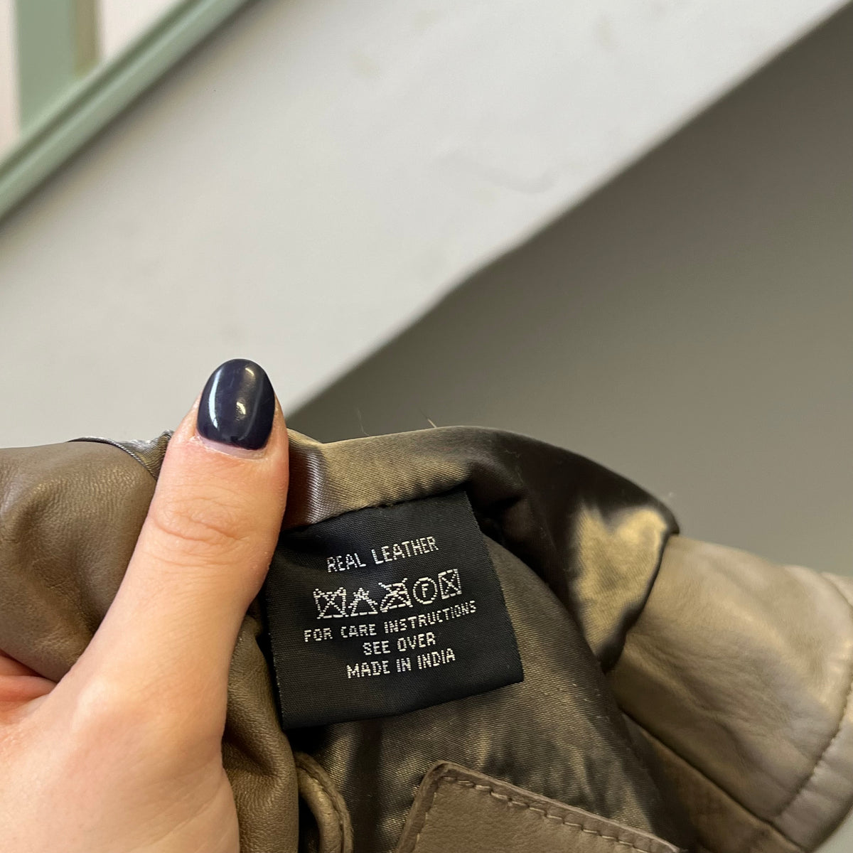 Brown scallop hem leather zip up jacket
