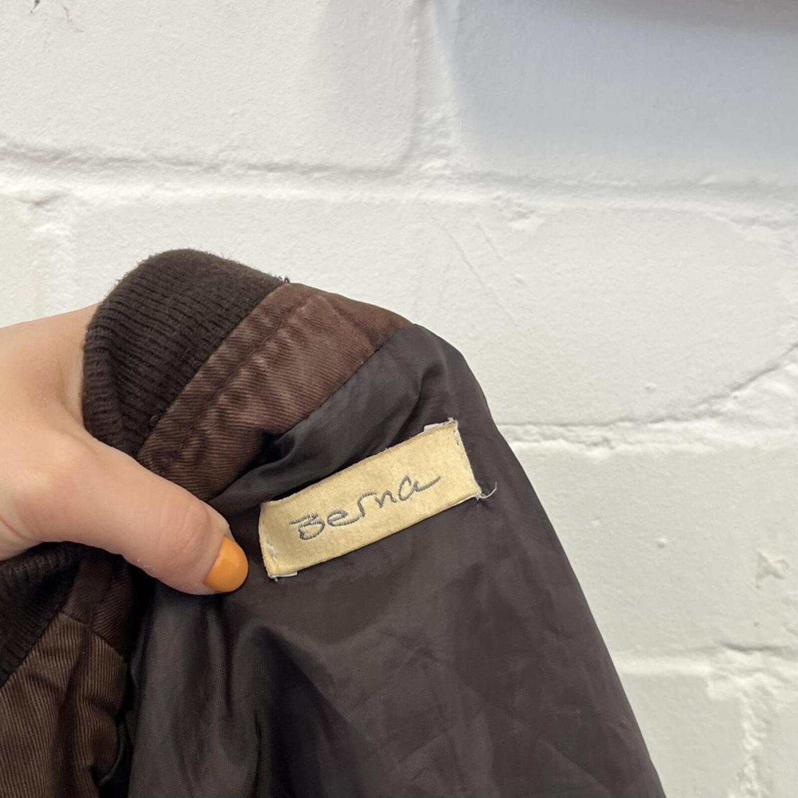 Dark brown leather zip up layered fitted vintage jacket with dual zip