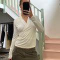 White fitted slouchy v neck top