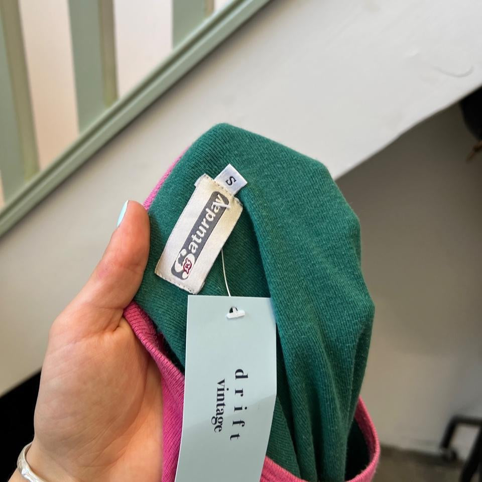 Green and pink graphic print baby tee