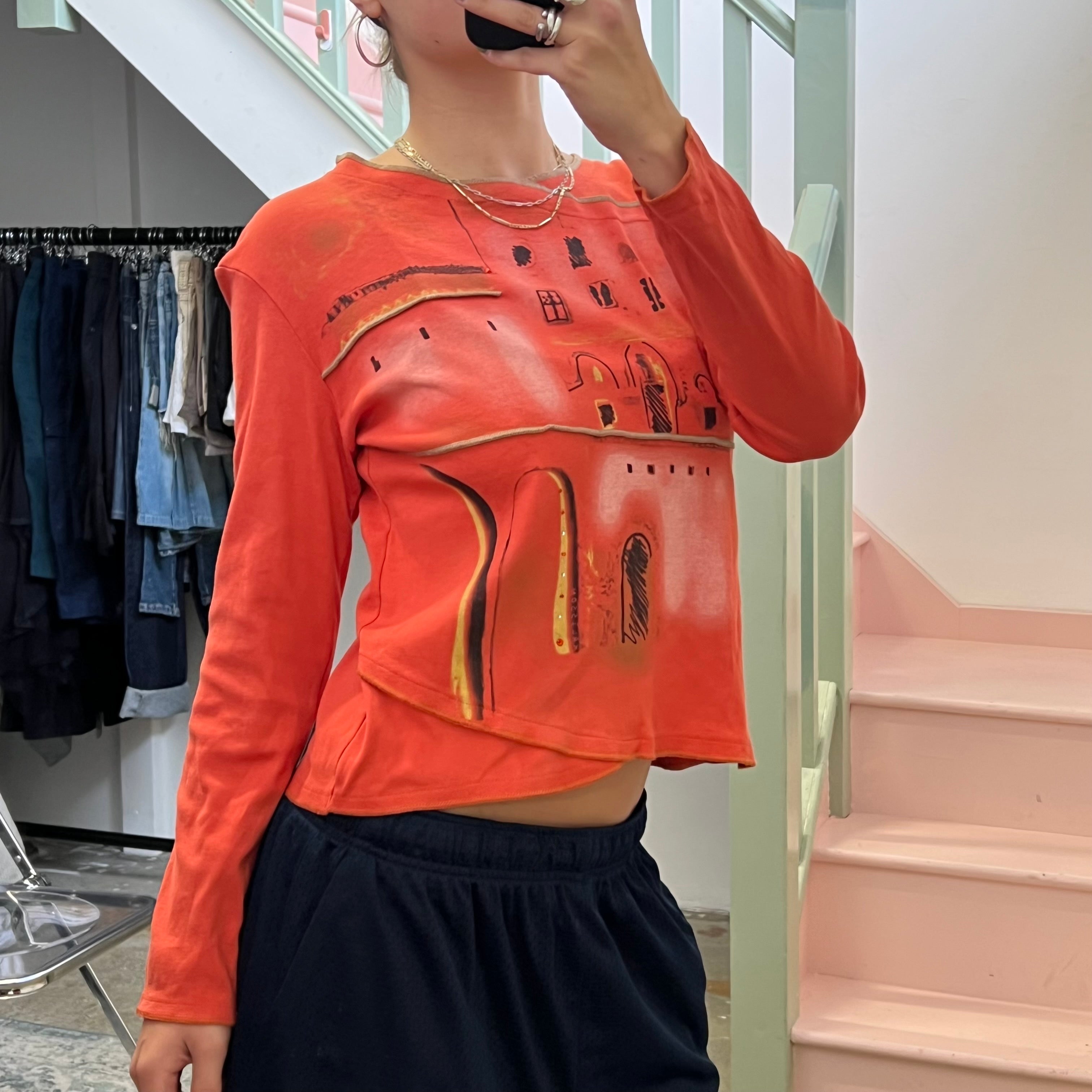 Orange graphic print top