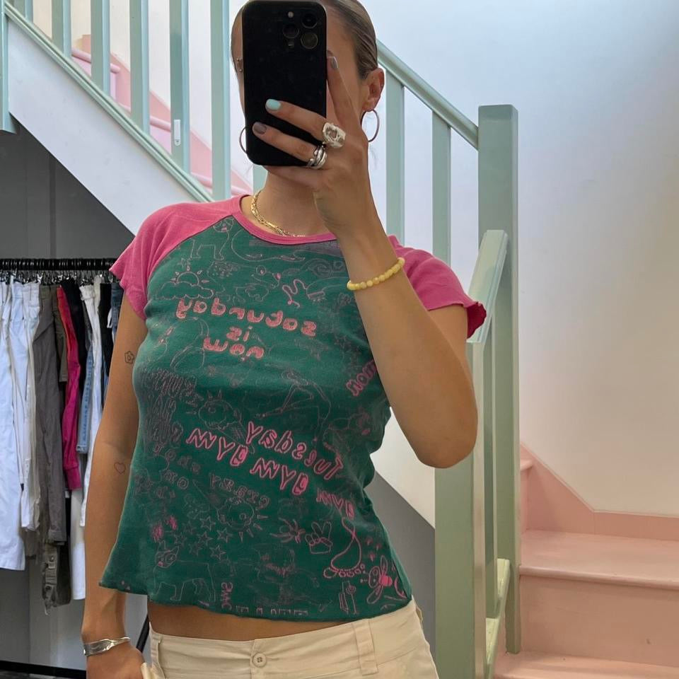Green and pink graphic print baby tee
