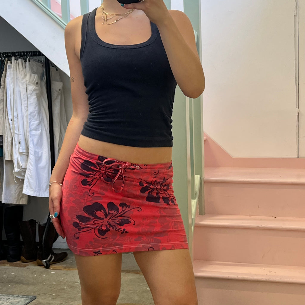 Red and purple hibiscus print mini skirt