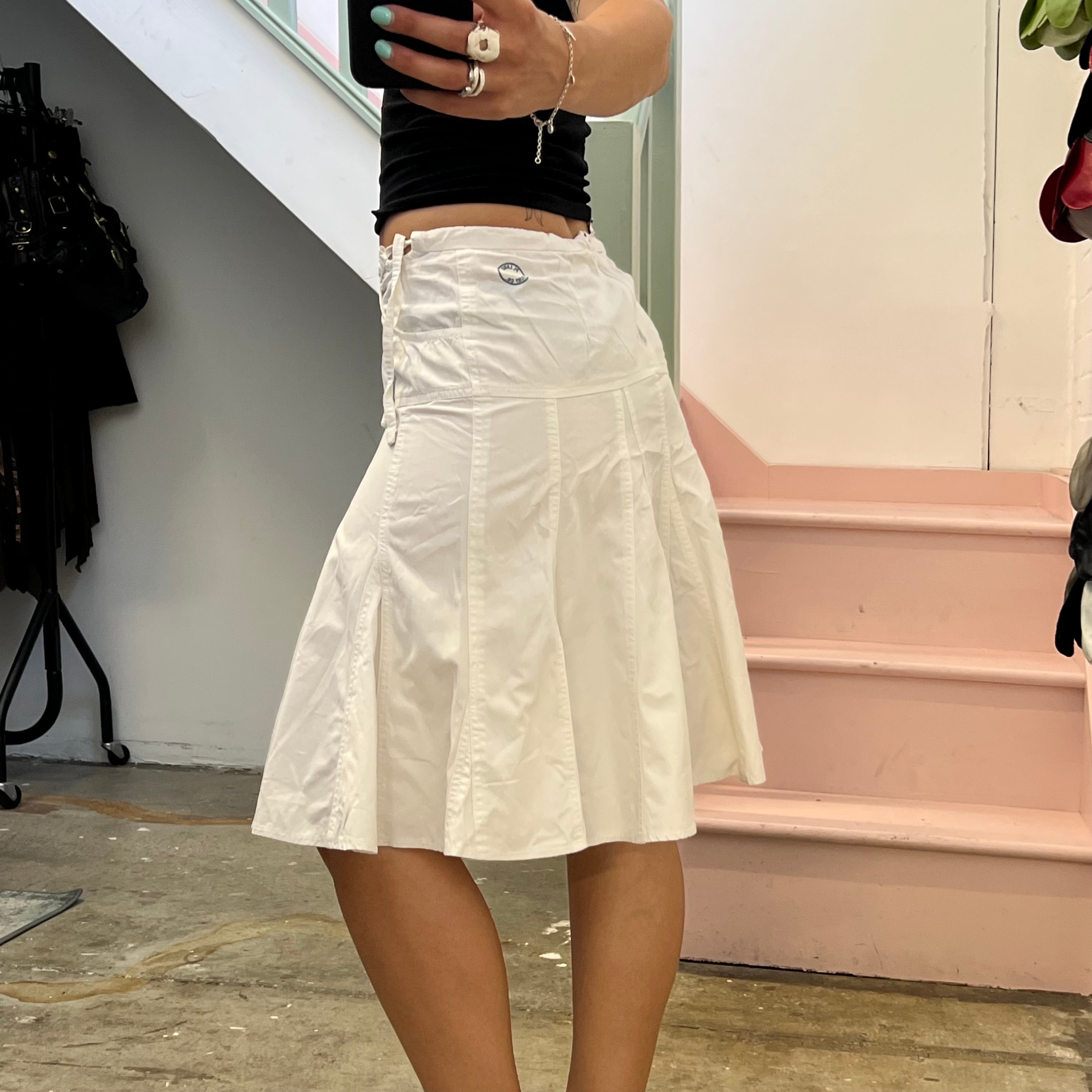 White pleated low rise midi skirt