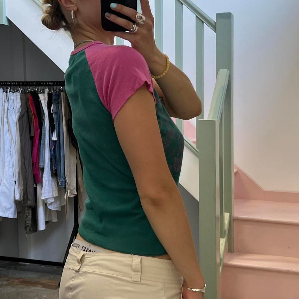 Green and pink graphic print baby tee