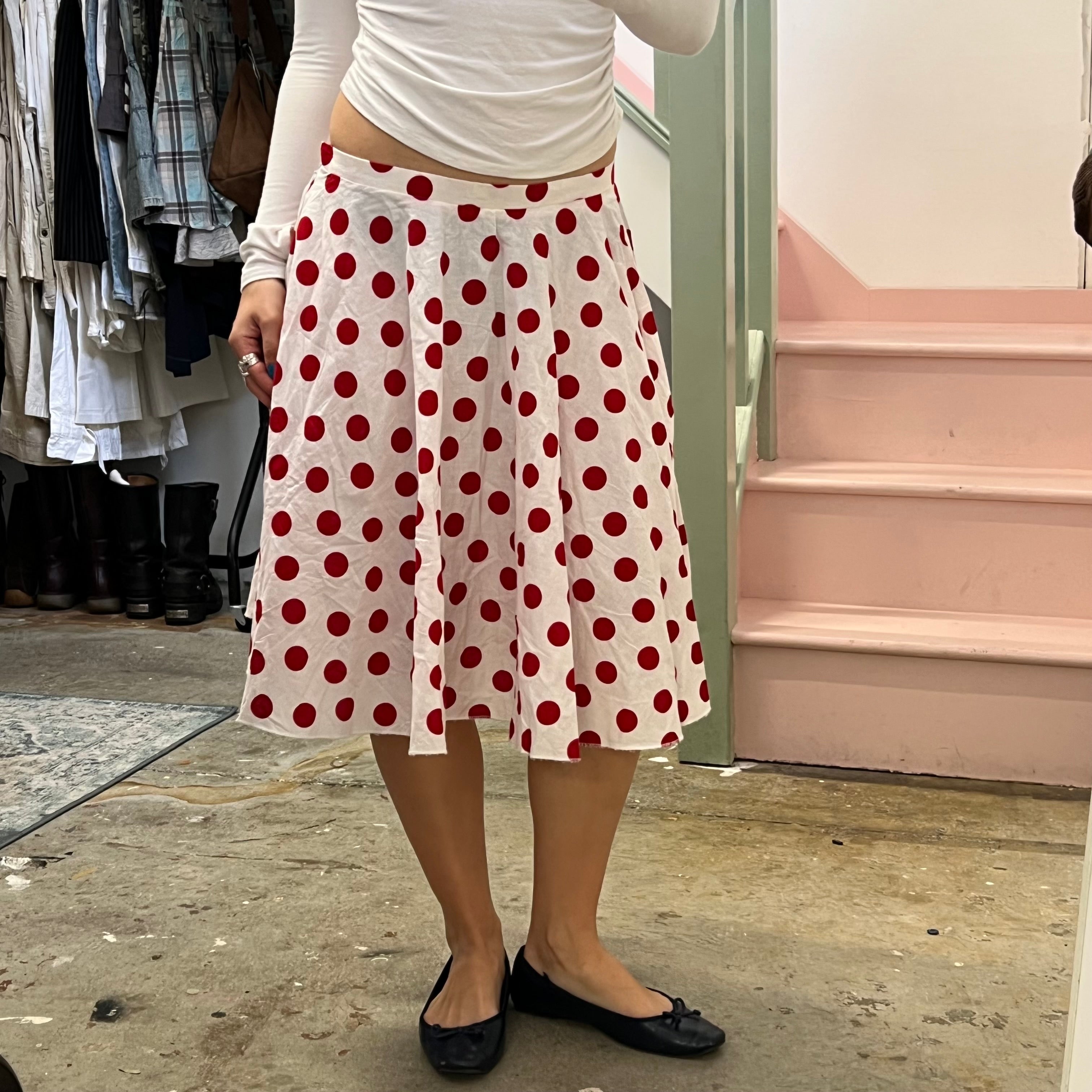 Red and white polka dot pleated midi skirt