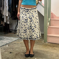 White and blue polka dot pleated midi skirt