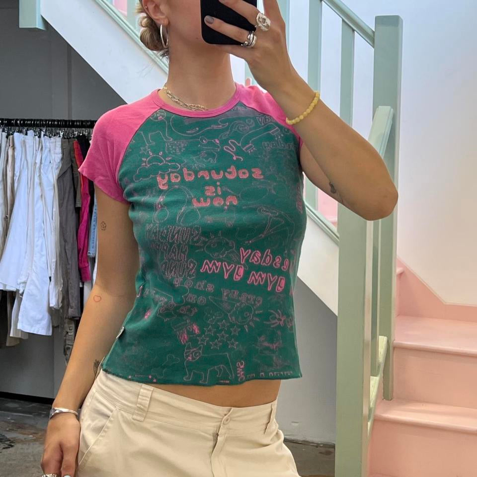 Green and pink graphic print baby tee