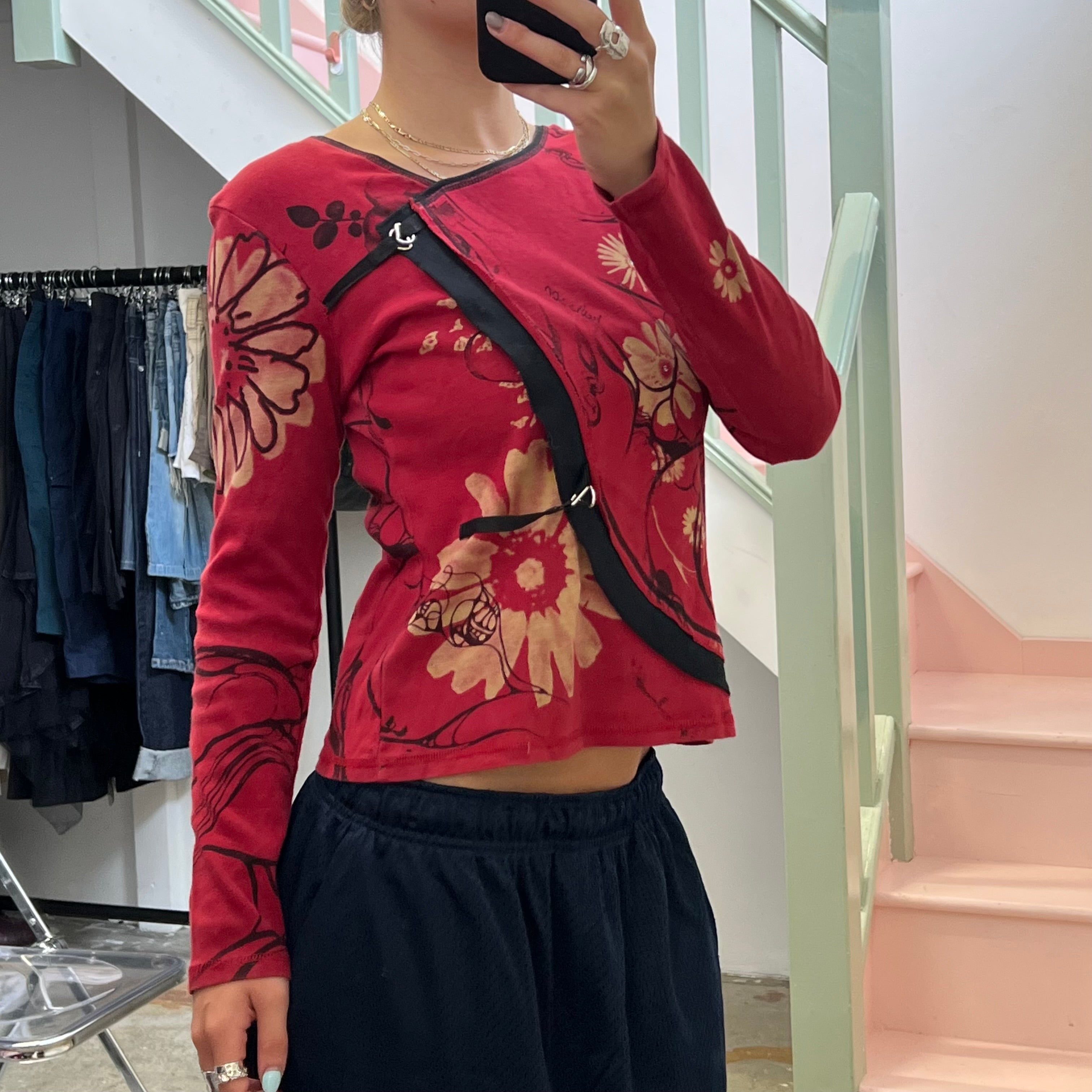 Red blurred floral long sleeve top