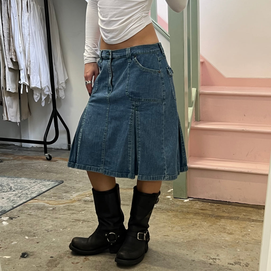 Denim pleated midi skirt with green stitching