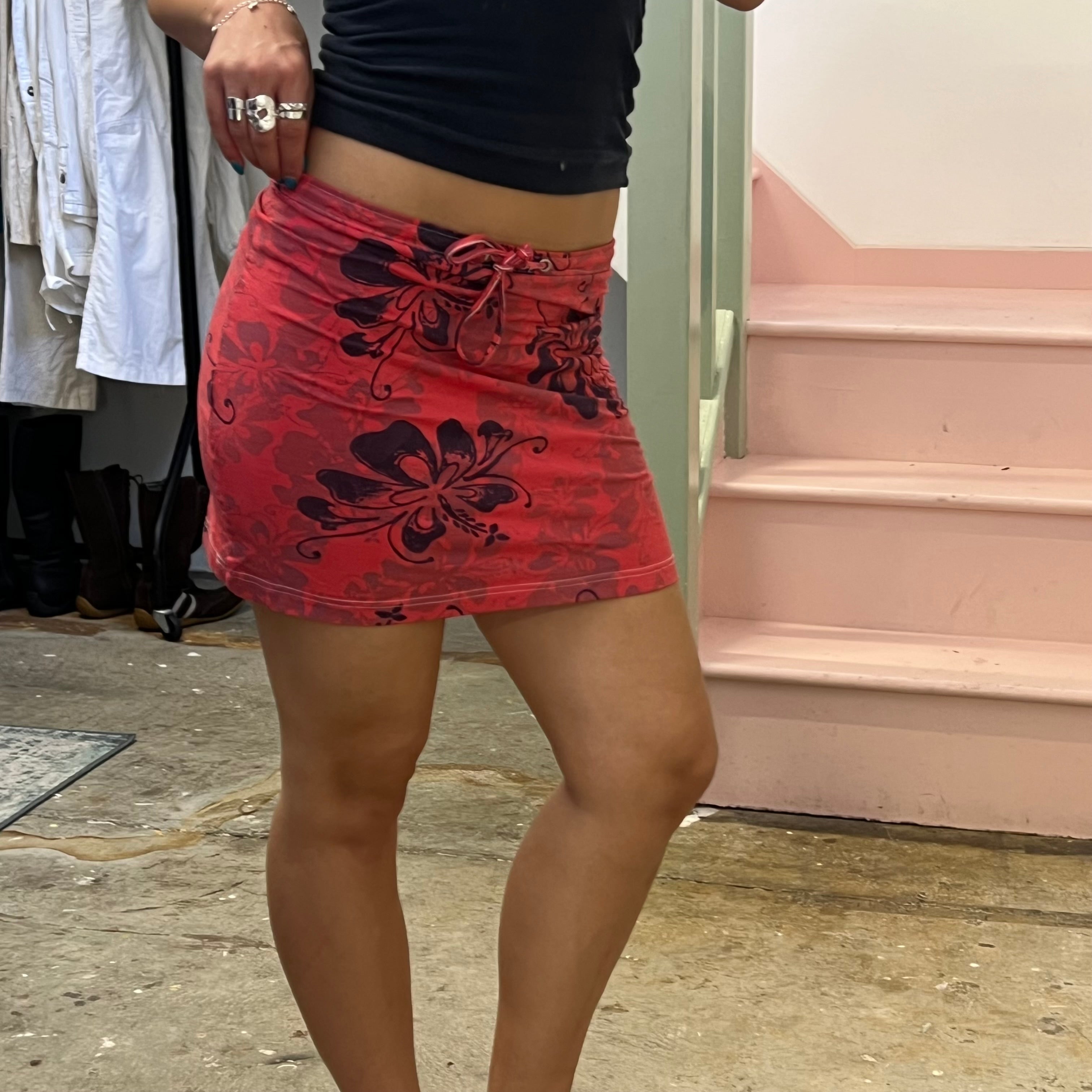 Red and purple hibiscus print mini skirt