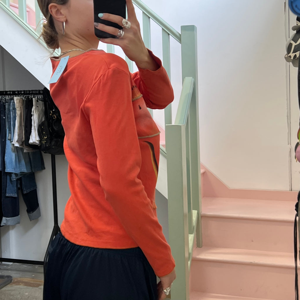 Orange graphic print top