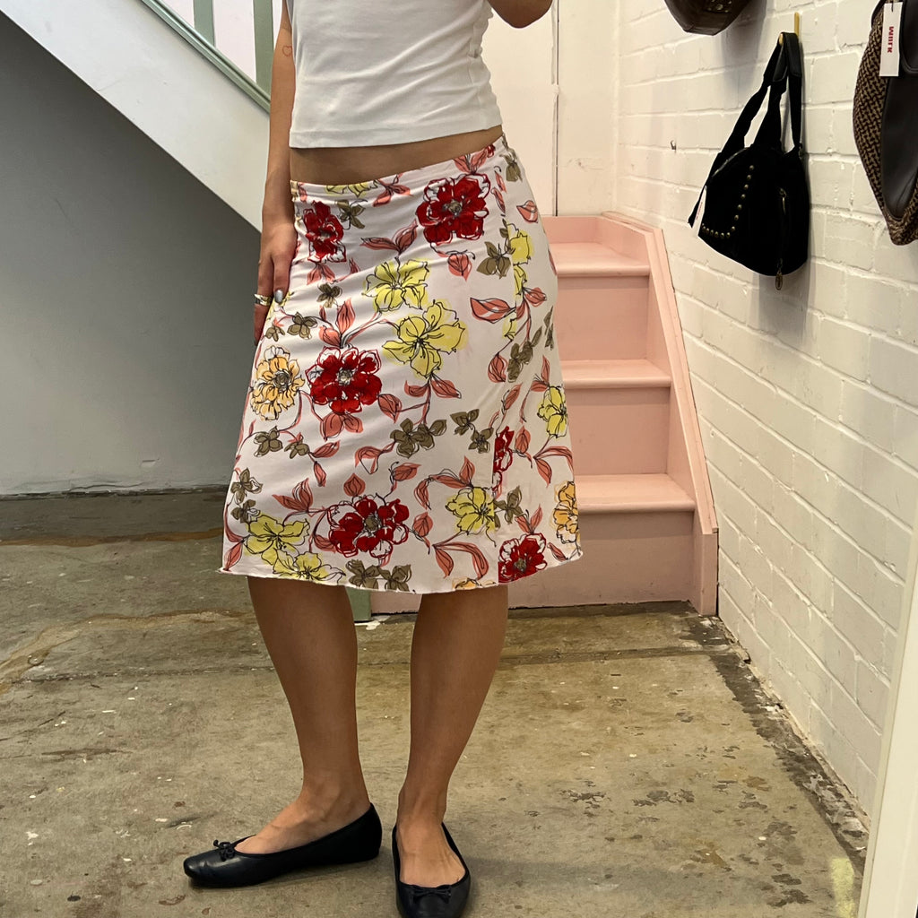 White red and yellow floral mid skirt