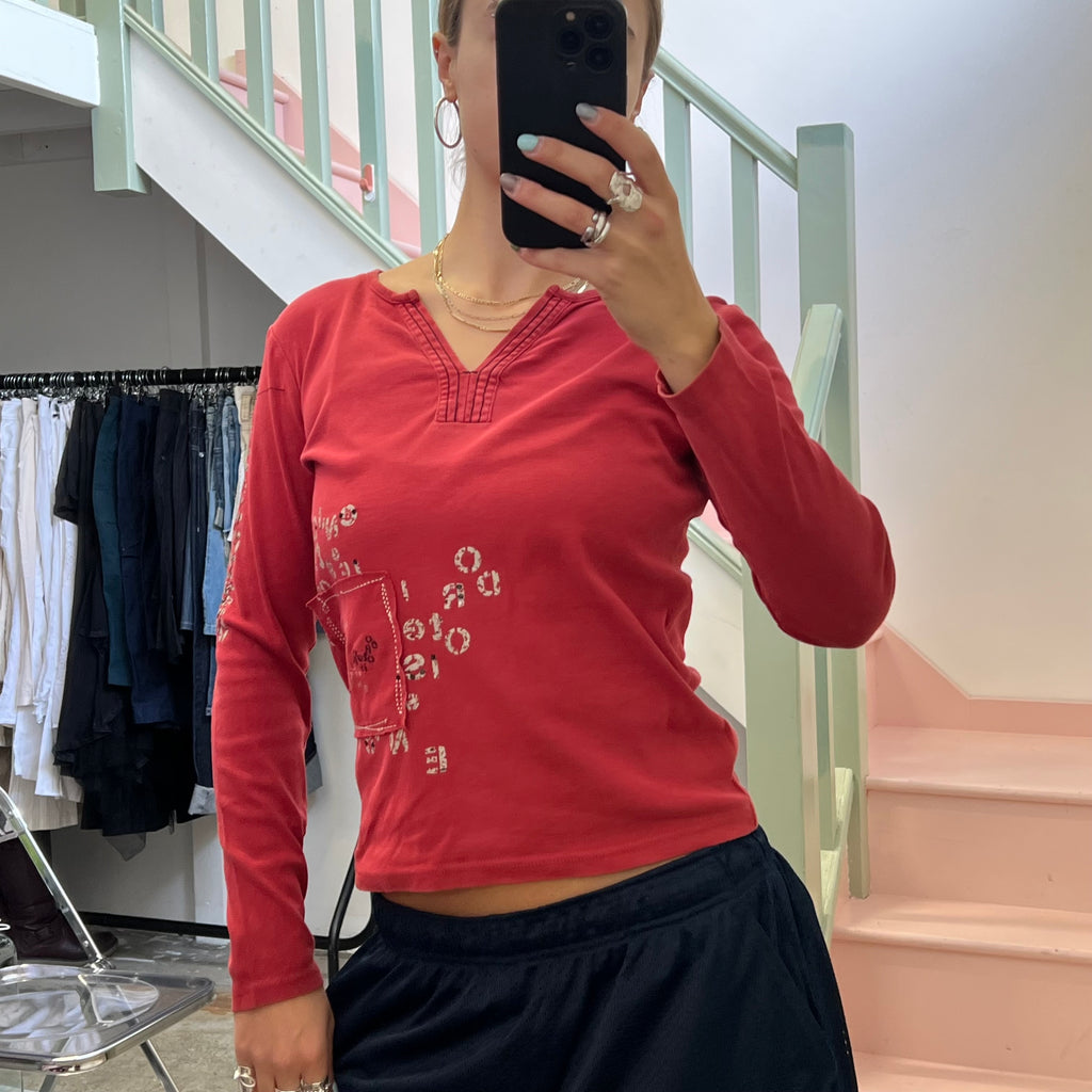 Red printed v neck top