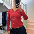 Red printed v neck top
