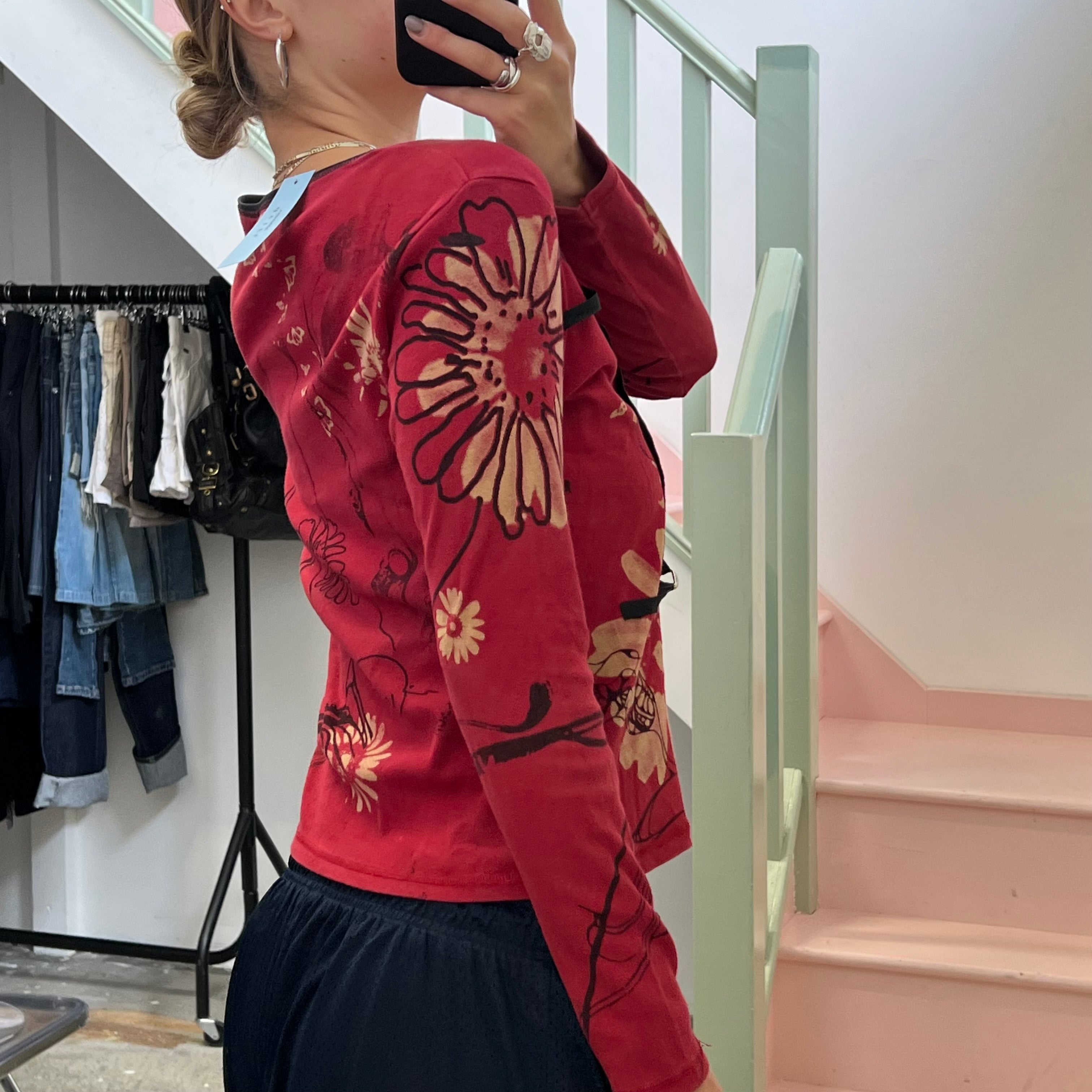 Red blurred floral long sleeve top