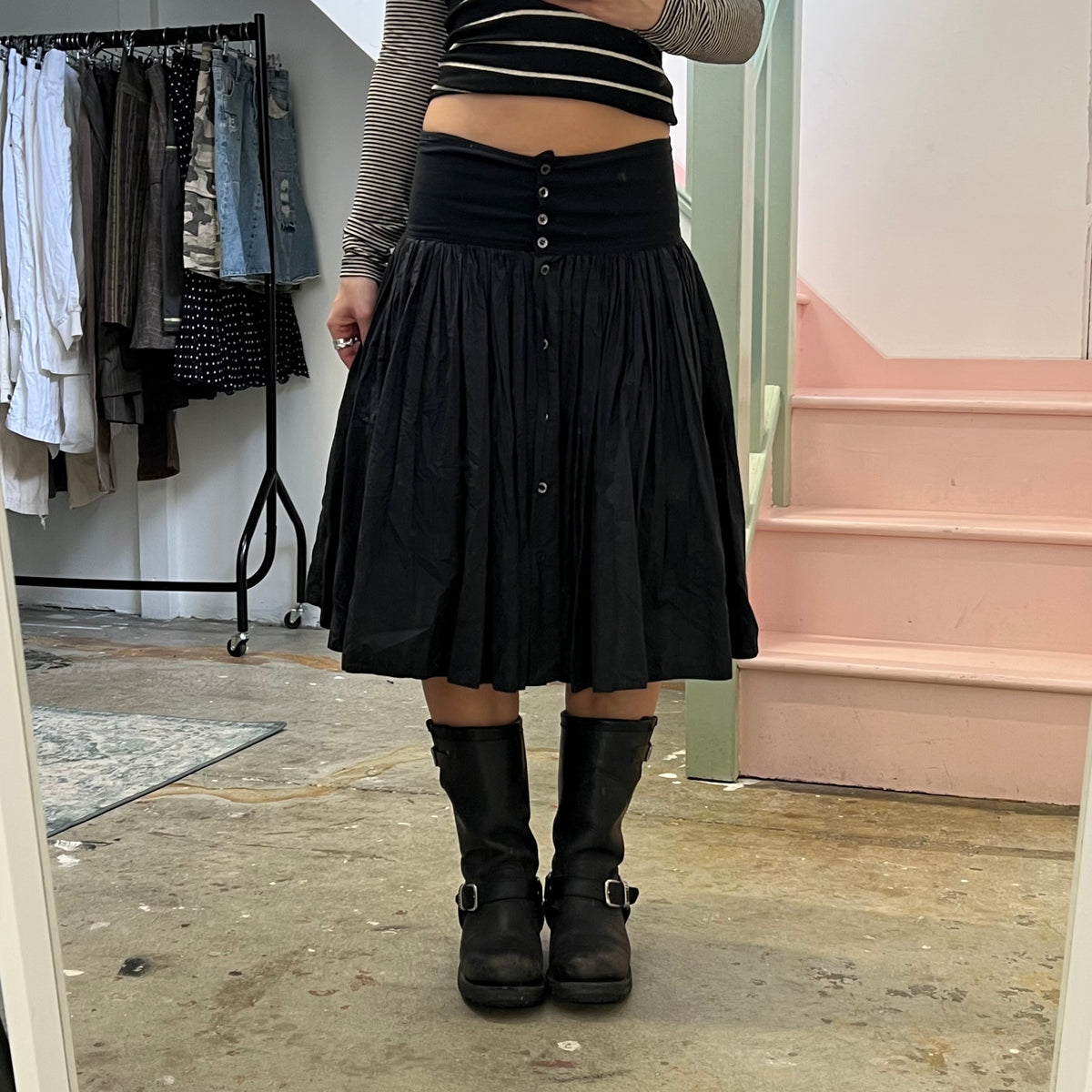 Black pleated midi skirt