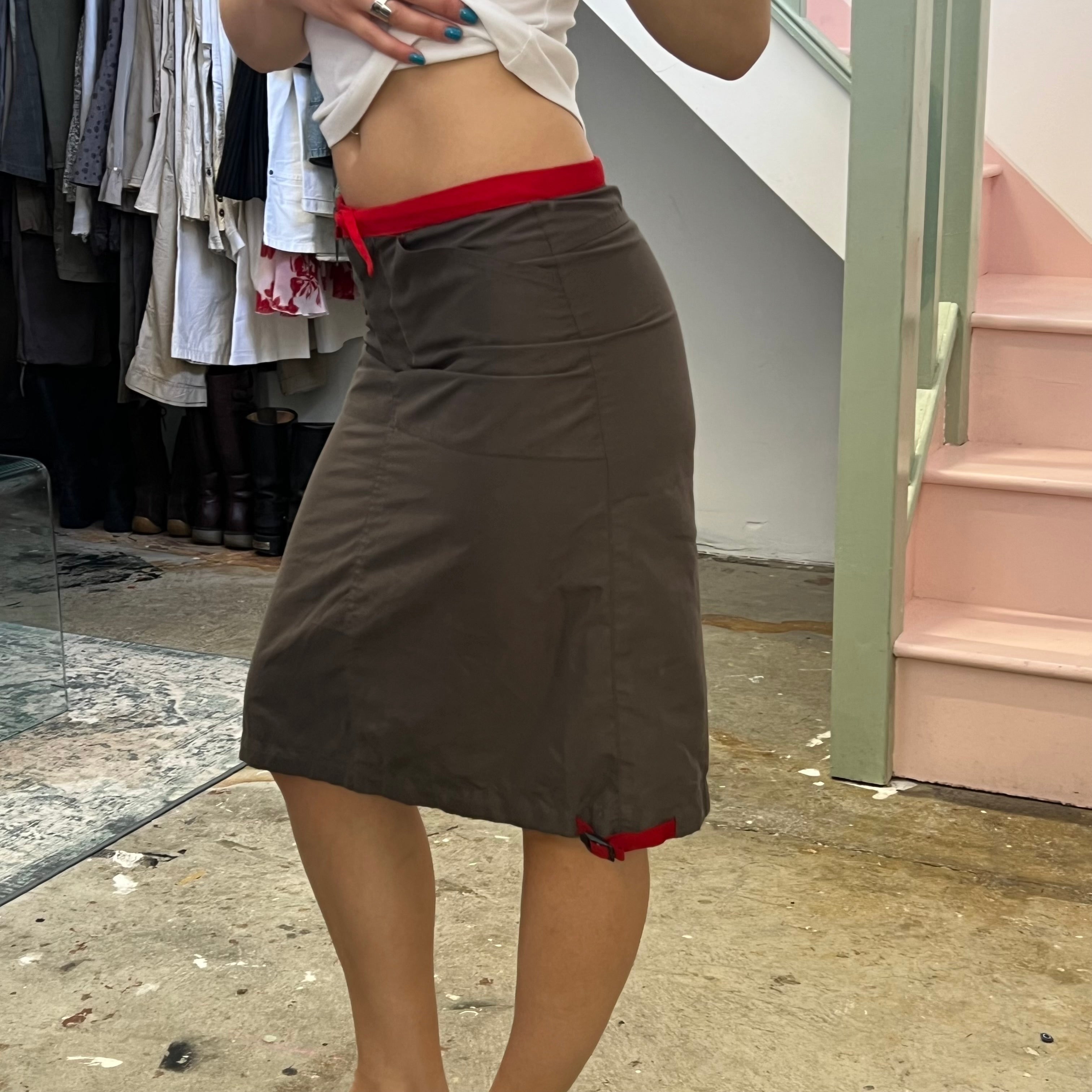 Khaki fitted cargo midi skirt with red trim