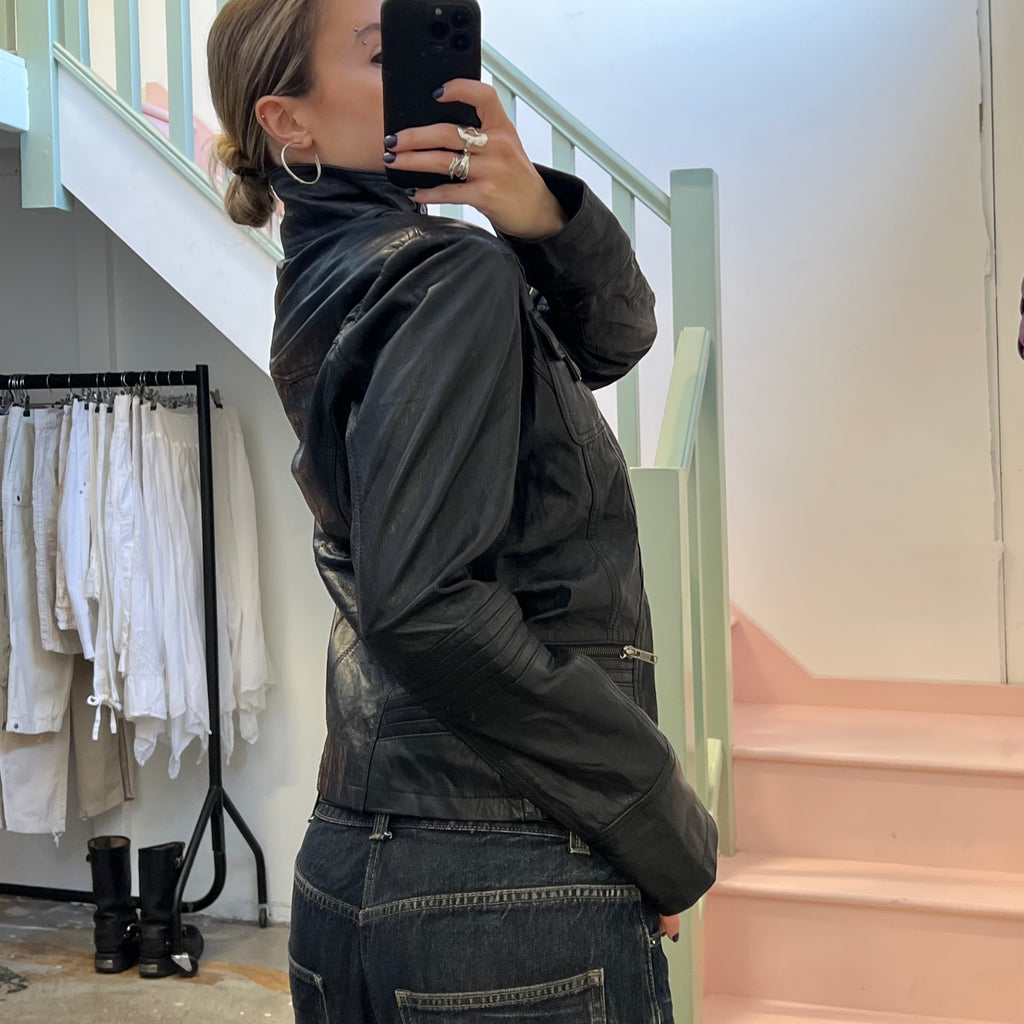 Black leather button up utility jacket
