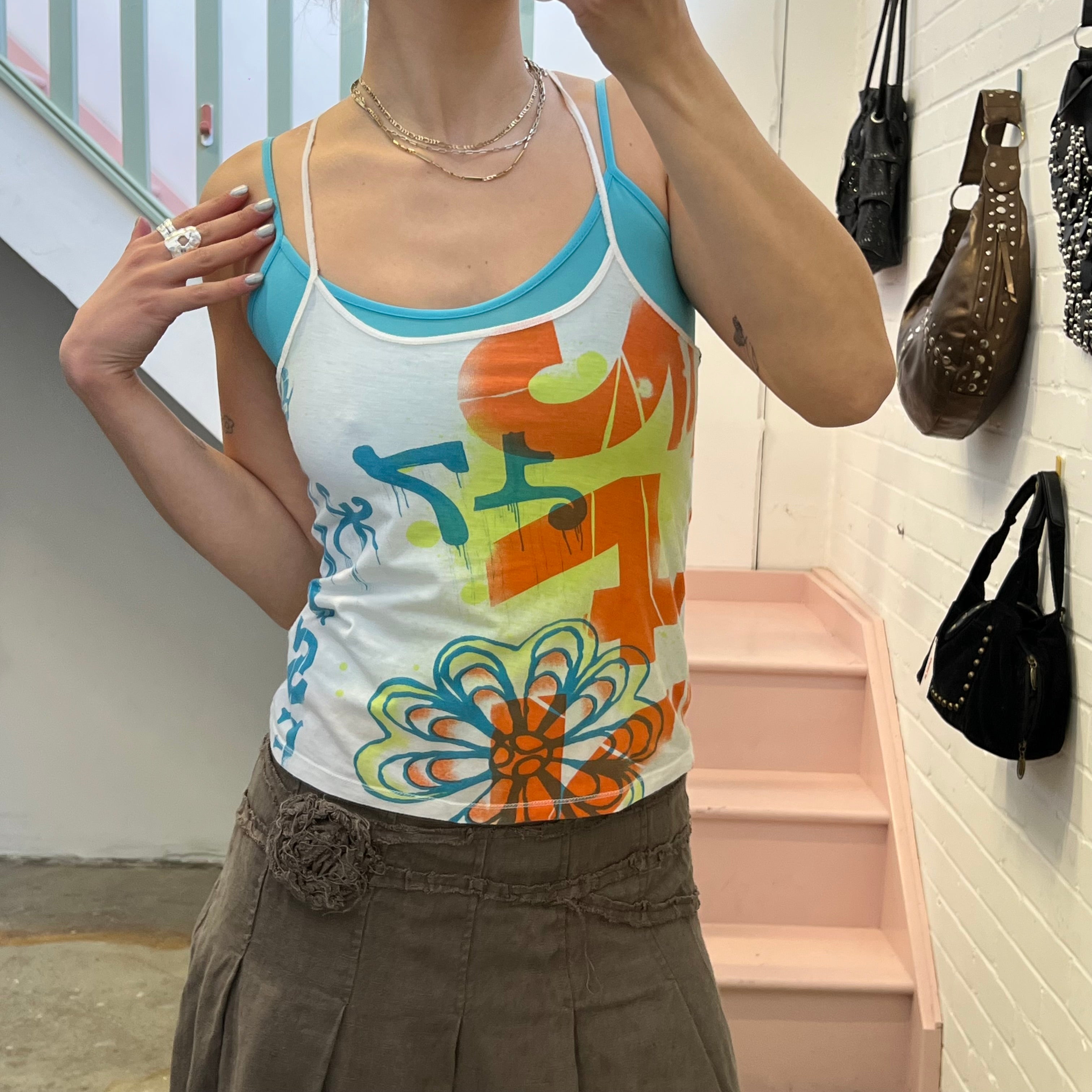 Graphic print layered vintage vest