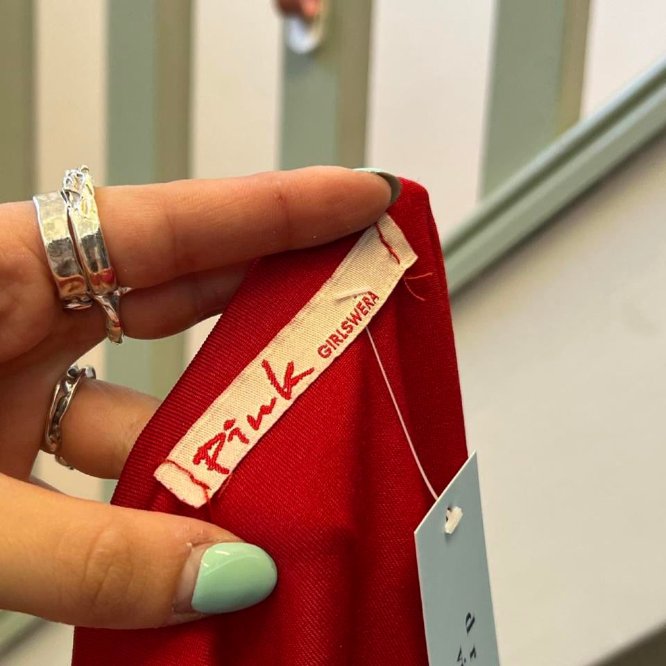 Red fitted slinky boat neck tee