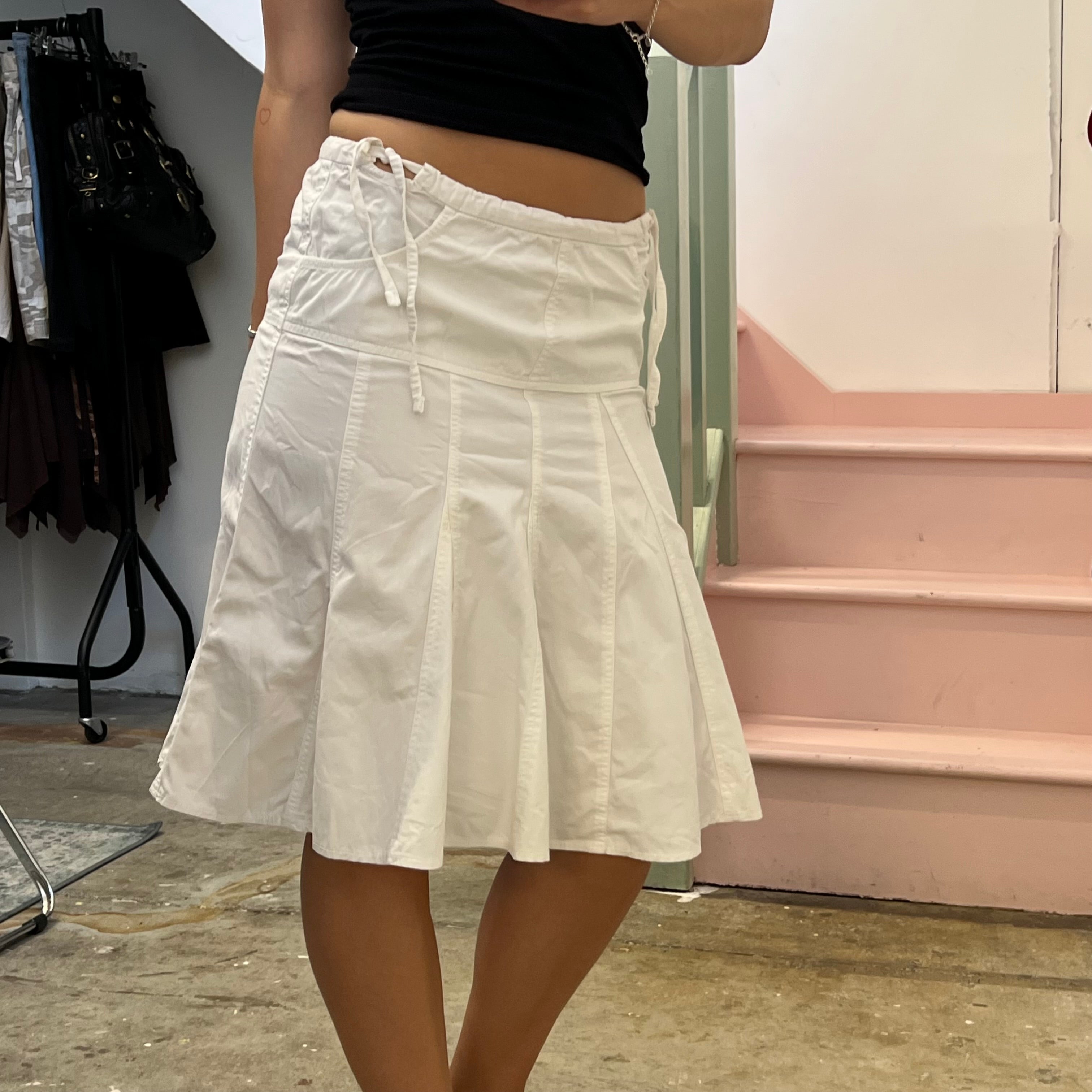 White pleated low rise midi skirt