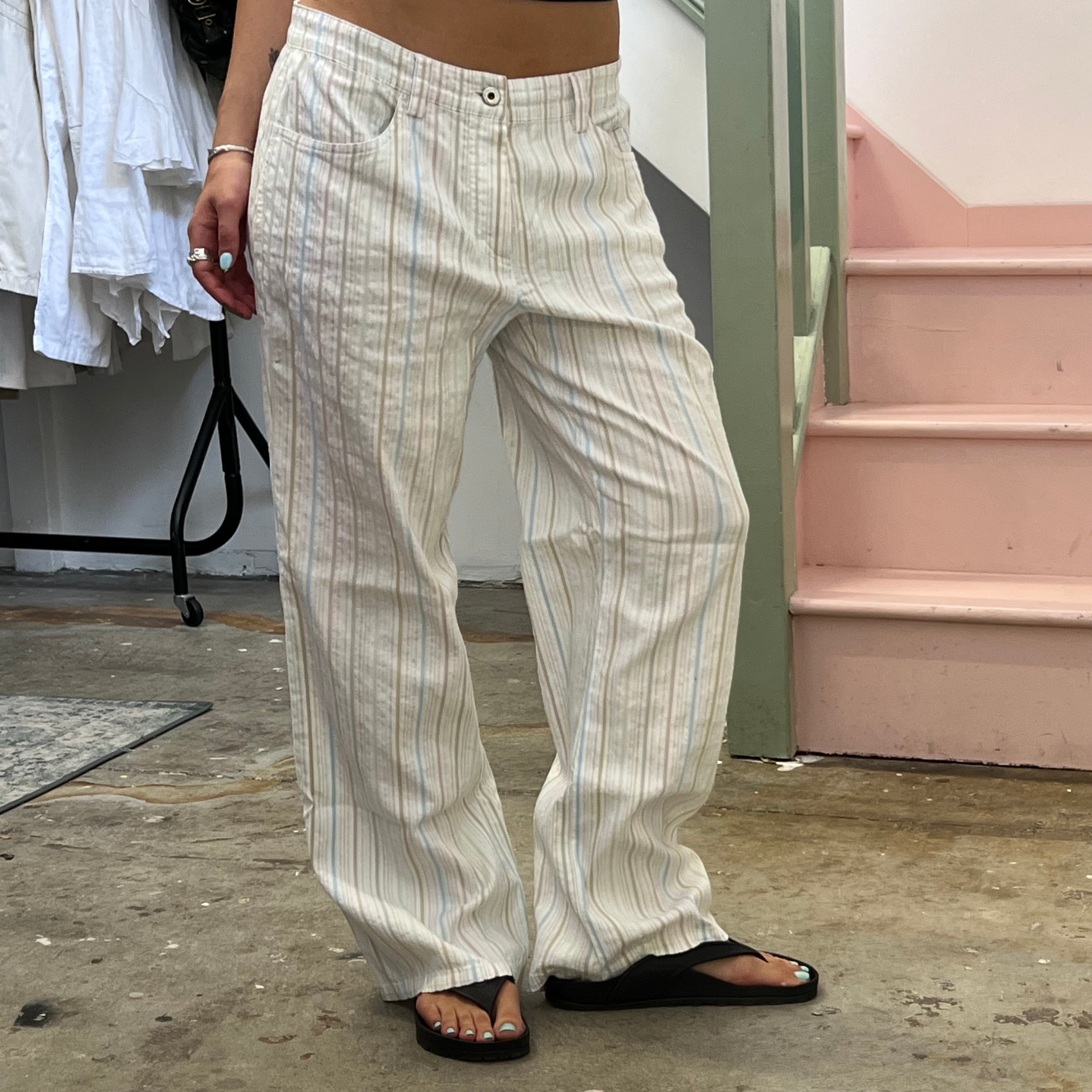 White and multi colour stripe trousers