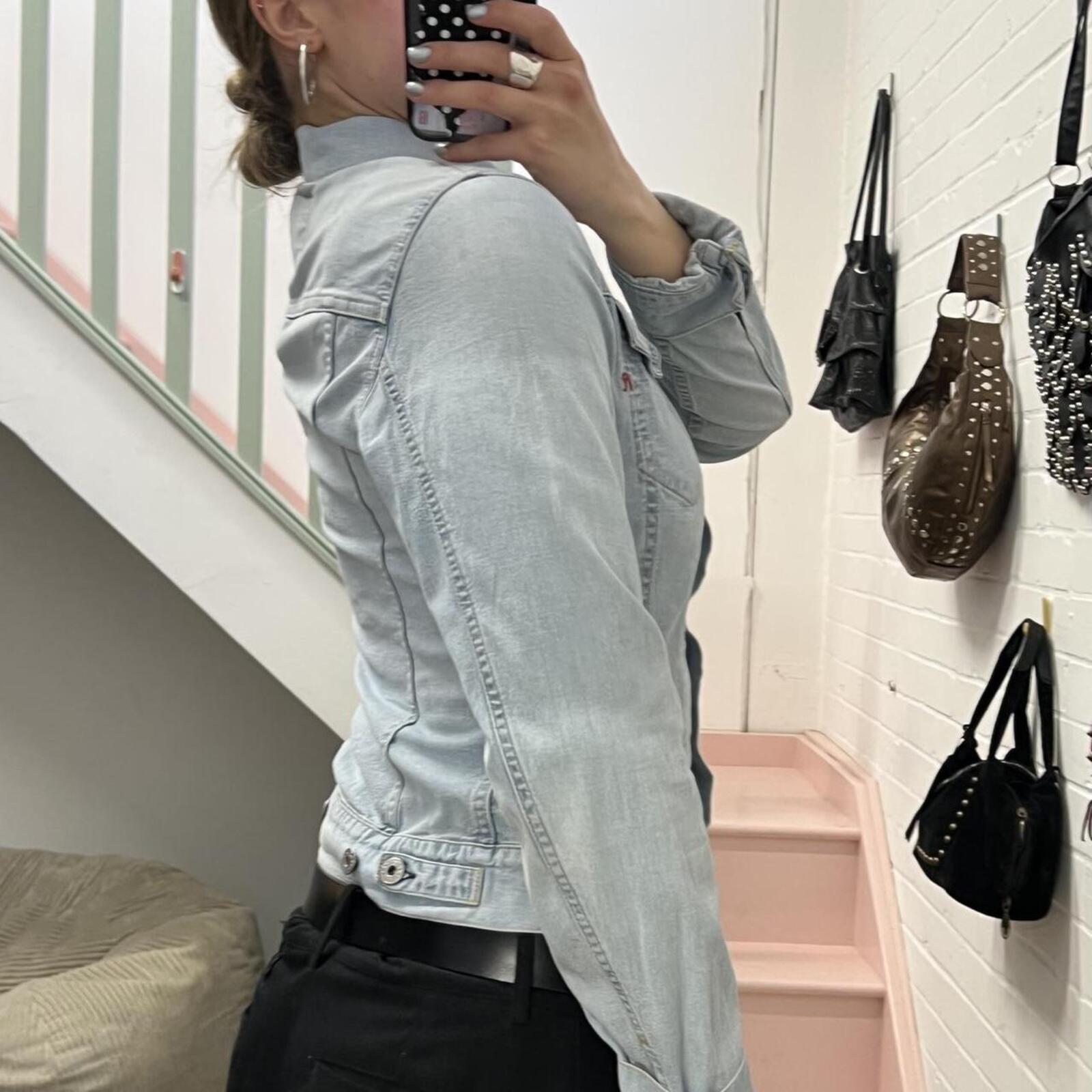 Baby blue light wash fitted button up denim jacket