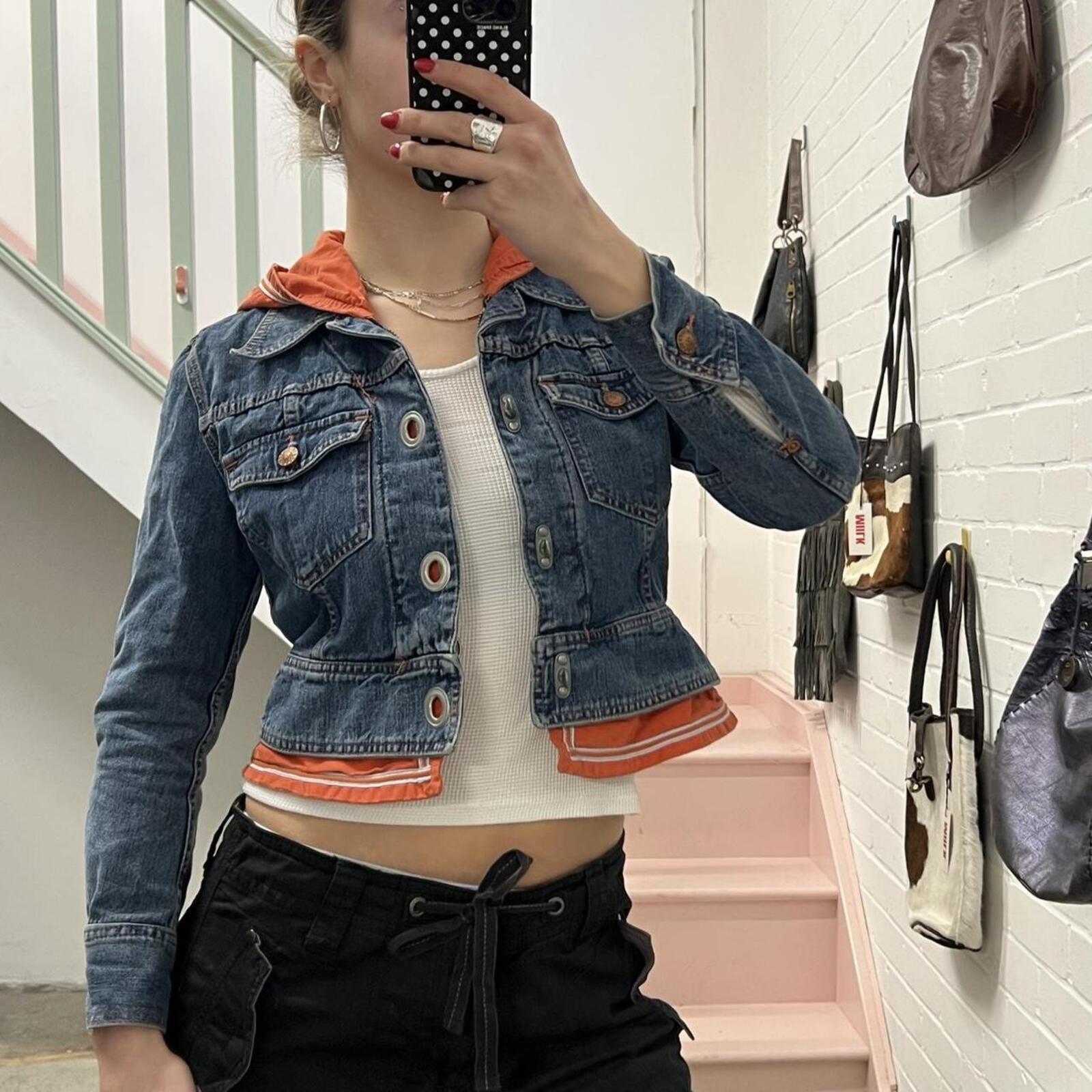 Fiorucci layered vintage denim jacket with orange hoodie layer