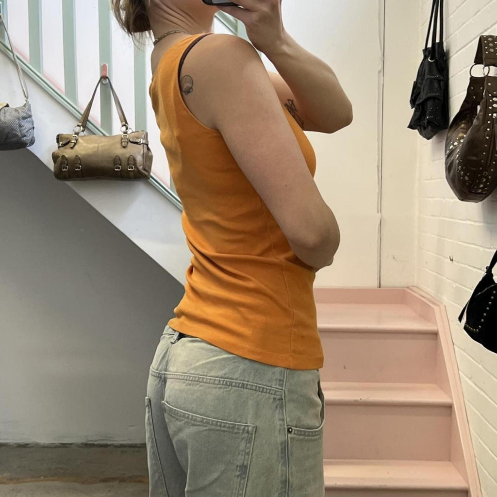 Orange fitted vintage vest with ring detail